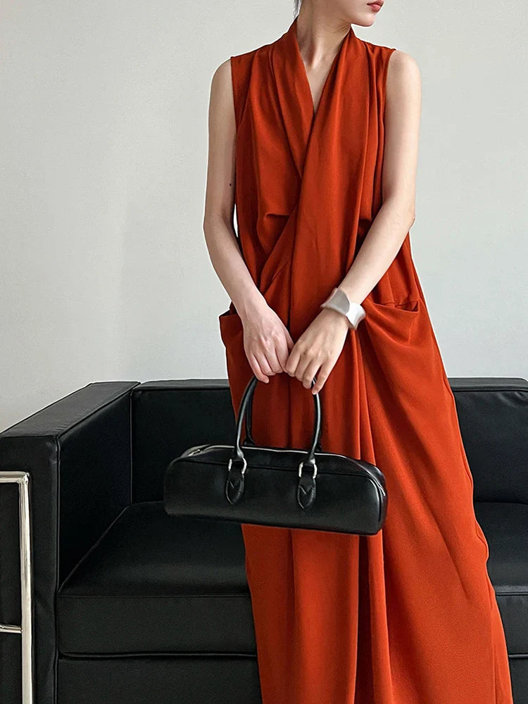 Elegant Draped Sleeveless Midi Dress with Pockets