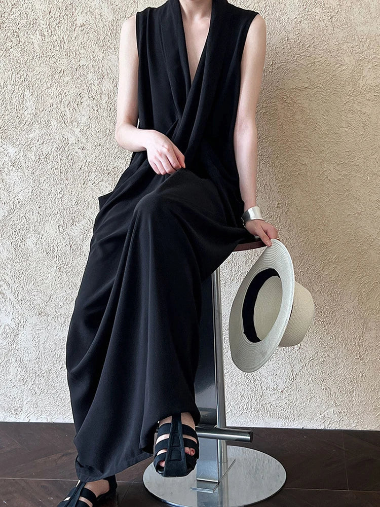 Elegant Draped Sleeveless Midi Dress with Pockets