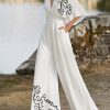 Half Sleeves High Waisted Flower Print Pleated Pockets Deep V-Neck Jumpsuits
